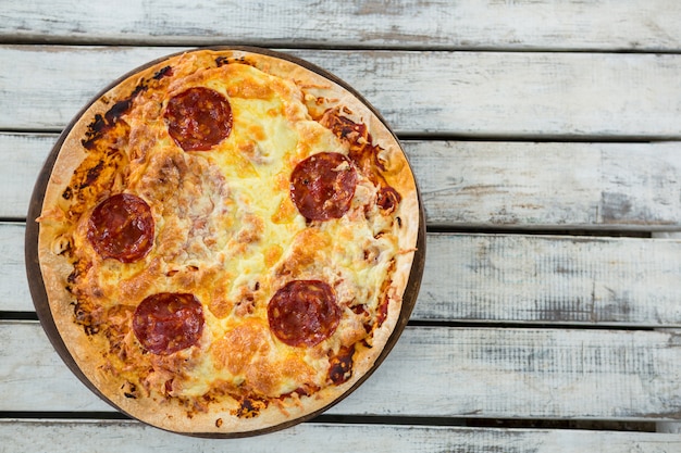 Italian pizza served on a pizza tray