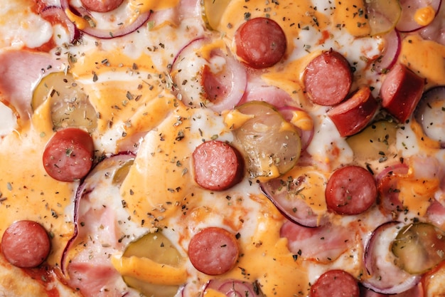 Italian pizza with sausages closeup