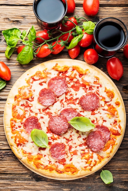 Italian pizza with tomato and salami