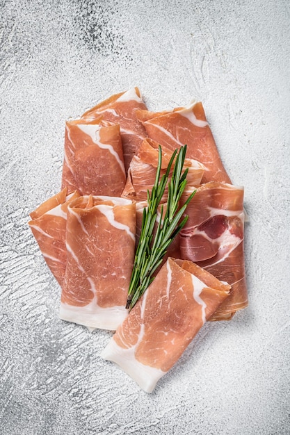 Italian prosciutto crudo parma ham on a table