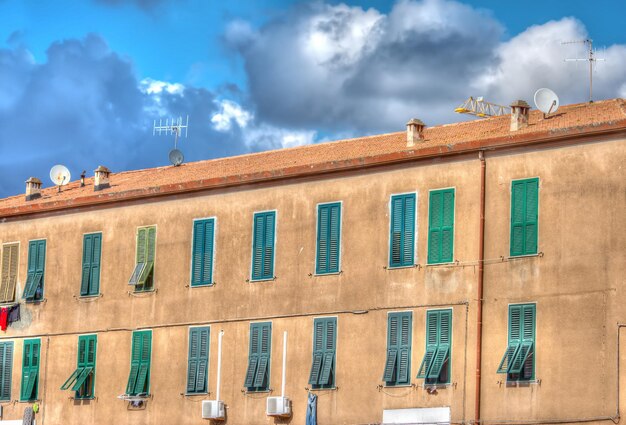 Italian public housing under a cloudy sky