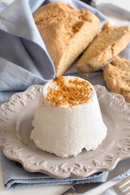 Italian ricotta cheese and homemade bread close up