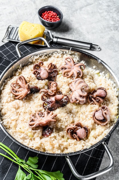 Italian Risotto with octopus and mushrooms. 