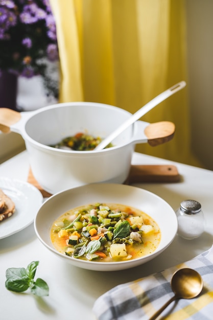 Italian soup minestrone served in a plate