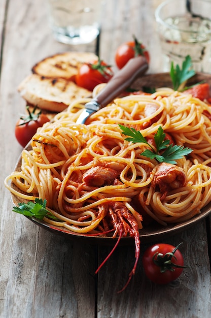 Italian spaghetti with shrimps and tomato