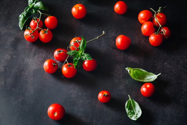 Italian style flat lay with tomatoes, garlic and spaghetti