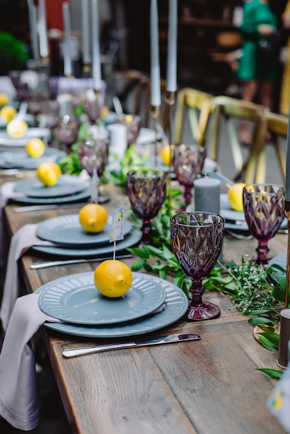 Italian summer decoration a lot of fresh yellow lemons Wedding decorations with lemon