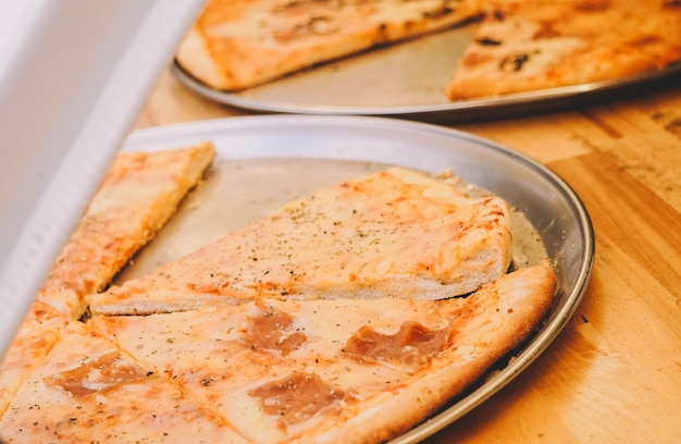 Italian thin crust pizza slices.