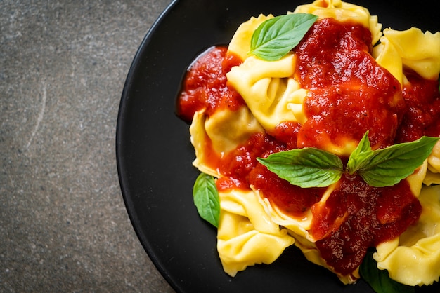 Italian tortellini pasta with tomato sauce - Italian food style