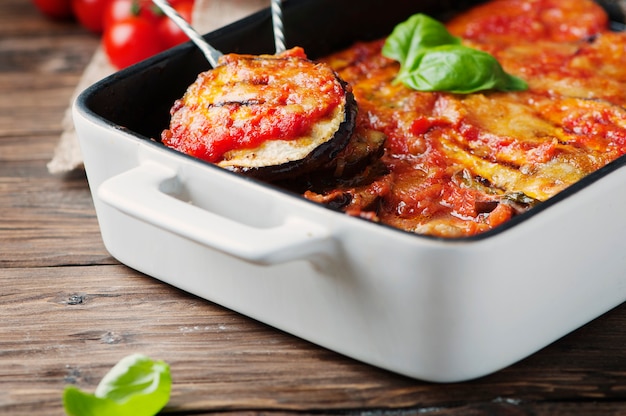 Italian traditional dish parmigiana with eggplant