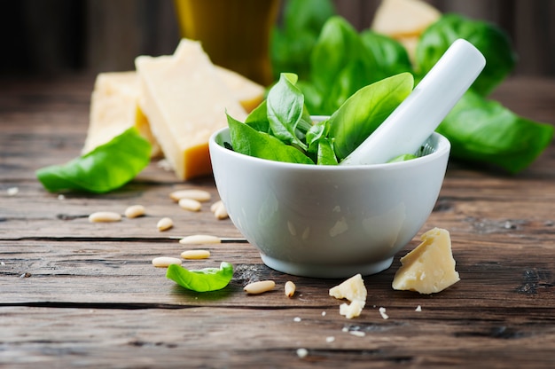 Italian traditional pesto on the wooden table