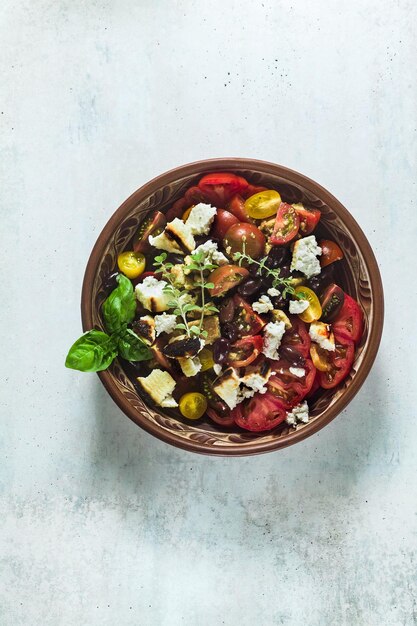 Italian traditional tuscan panzanella salad with fresh tomatoes\
and cheese