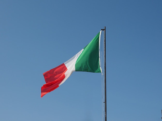 Italy flag over blue sky