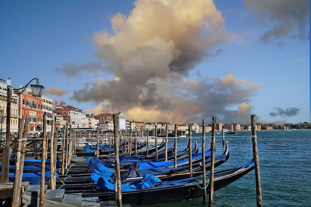 Italy Luxury Gondola waiting for tourists near Rialto Bridge and Sain Marco square in Venice