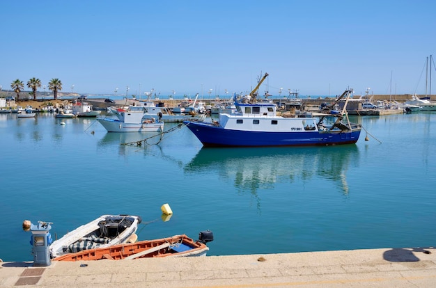 Italy, Mediterranean Sea, Sicily, Scoglitti (Ragusa Province), wooden fishing boats in the port