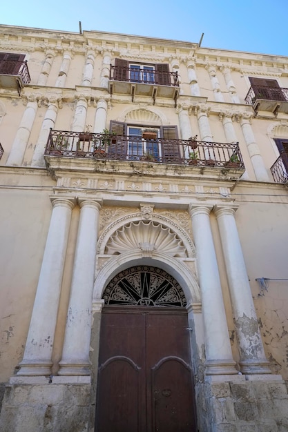 Italy, Sicily, Licata (Agrigento Province), Liberty palace facade and balconies downtown (XVIII century)