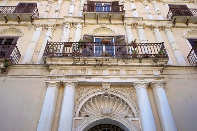 Italy, Sicily, Licata (Agrigento Province), Liberty palace facade and balconies downtown (XVIII century)