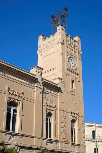 Photo italy, sicily, licata (agrigento province), liberty palace facade and tower downtown (xviii century)