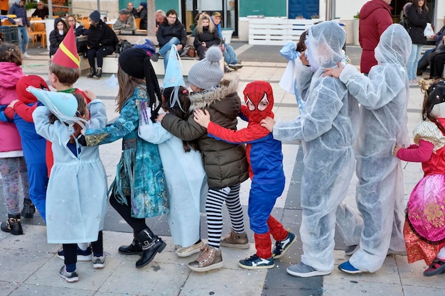 Italy, Sicily, Marina di Ragusa (Ragusa Province); 2 March 2019, kids playing for Carnival in a central square of the town - EDITORIAL