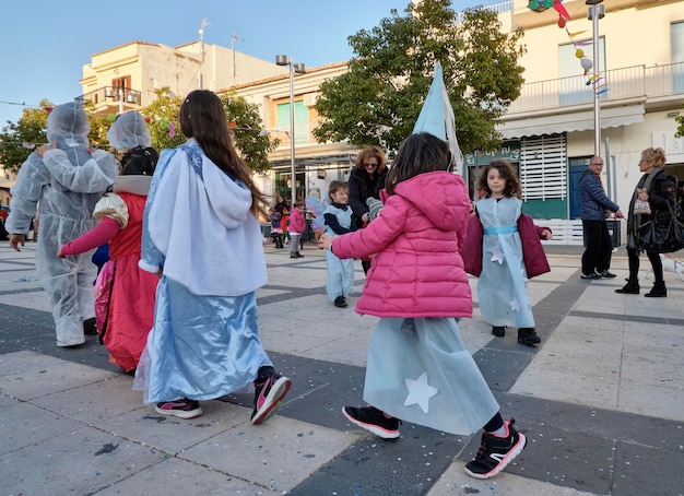 Italy, Sicily, Marina di Ragusa (Ragusa Province); 2 March 2019, kids playing for Carnival in a central square of the town - EDITORIAL