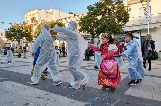 Italy, Sicily, Marina di Ragusa (Ragusa Province); 2 March 2019, kids playing for Carnival in a central square of the town - EDITORIAL