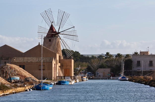 Italy, Sicily, Marsala (Trapani), Mozia salt flats and an old windmill