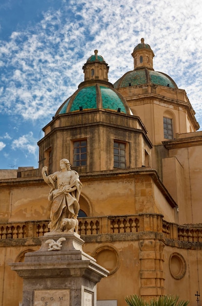Italy, Sicily, Mazara del Vallo (Trapani Province), the Statue in Republic Square and the Cathedral's domes
