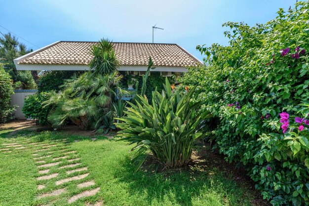 Italy, Sicily, Mediterraean Sea, Torre di Mezzo (Ragusa Province); 18 June 2018, private garden's house by the sea - EDITORIAL