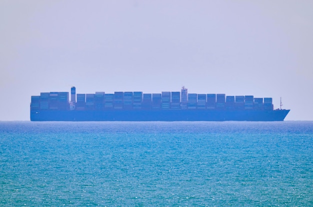 Italy, Sicily, Mediterranean sea; container ship in the Sicily Channel