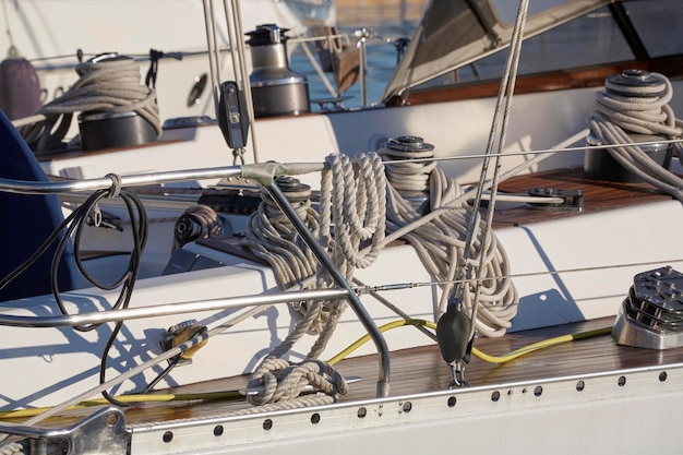 Italy, Sicily, Mediterranean Sea, Marina di Ragusa (Ragusa Province); winch and nautical ropes on a sailing boat in the port