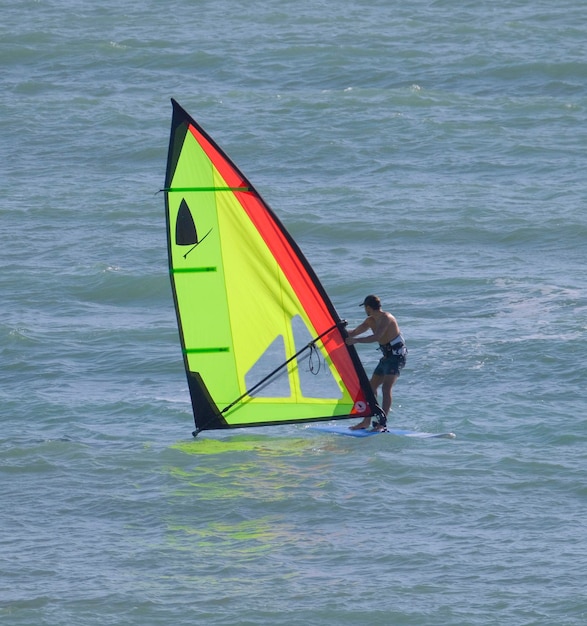 Italy, Sicily, mediterranean Sea, Marina di Ragusa (Ragusa Province); windsurfer in the sea