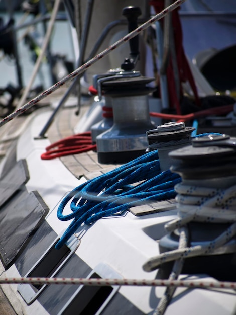 Italy, Sicily, Mediterranean Sea, sailing boat in a marina, winch and nautical cables