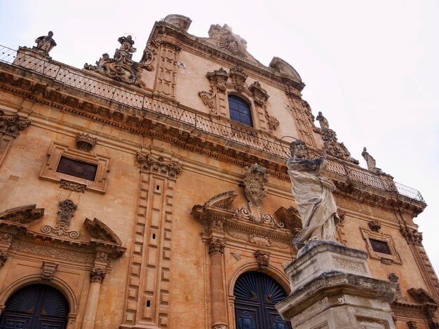 Italy, Sicily, Modica (Ragusa Province), St. Peter's Cathedral, baroque facade and statue