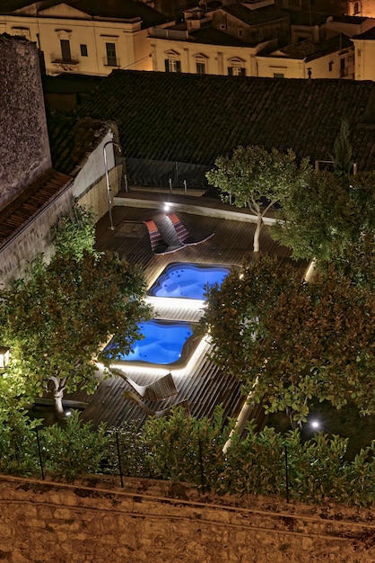 Italy, Sicily, Modica (Ragusa Province), whirlpools in a garden at night