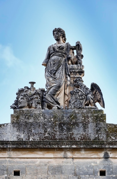 Italy, Sicily, Noto (Siracusa Province), baroque theater facade, ornamental statues on the roof