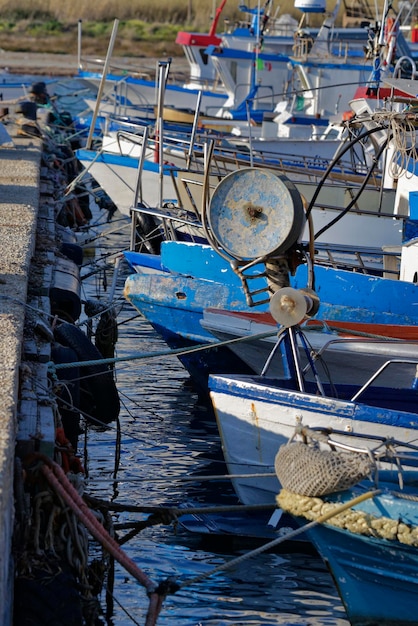 Italy, Sicily, Portopalo di Capo Passero, wooden fishing boats in the port