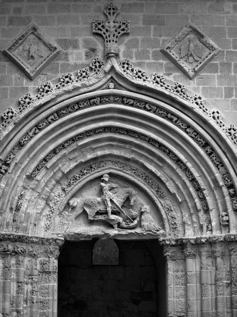italy, sicily, ragusa ibla, the gothic st. george cathedral portal (xii century). the rest of the church was destroyed by the 1693 earthquake