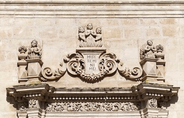 Italy, sicily, ragusa ibla, purgatory saint souls baroque church (chiesa delle anime sante del purgatorio), 1757 a.c., statues and decorations on the baroque facade of the church