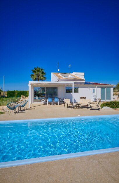 Italy sicily ragusa province countryside 9 october 2021 elegant private house view of the swimming pool in the garden editorial