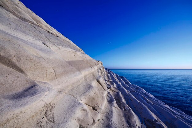 Italy, sicily, realmonte, view of the turkish staircase at sunset