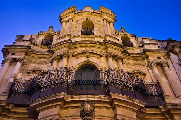 Italy, Sicily, Scicli (Ragusa province), Baroque church facade at sunset