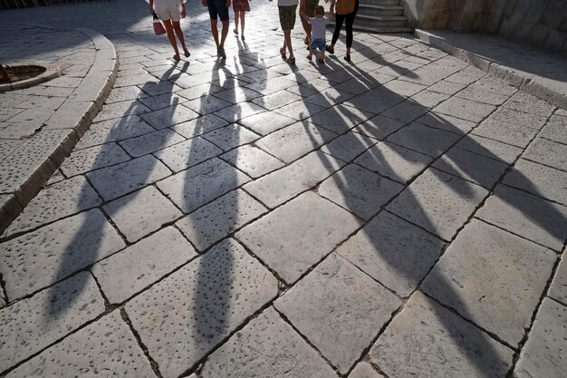 Italy, Sicily, Scicli (Ragusa province), people walking in the baroque central Mormino Penna Street