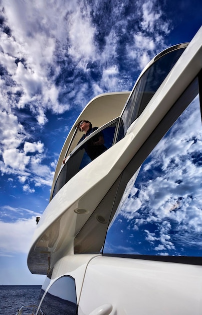 Italy Tuscany Elba Island luxury yacht Azimut 75' woman on the flybridge