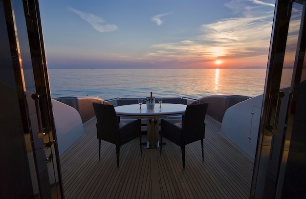 Italy, Tuscany, Viareggio, Tecnomar Velvet 83 luxury yacht, poop deck at sunset