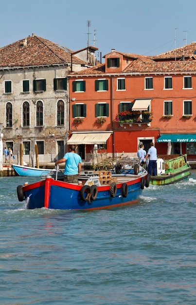 Italy Venice Murano Island boats in one of the island channels