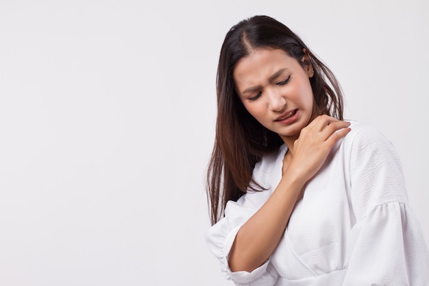 Itching woman scratching her skin