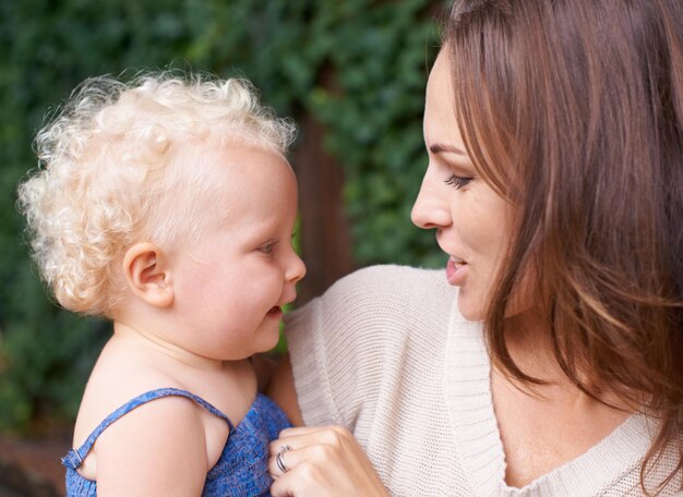 Its just mommy and me A young mother holding her adorable baby