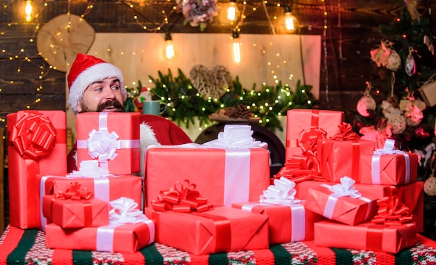 Its for me. winter shopping sales. Cheerful elf. hipster santa hat. Christmas shopping. bearded man. happy new year. Xmas present box. christmas gift delivery. Cyber Monday.