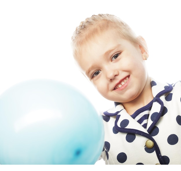 Ittle girl with blue balloons