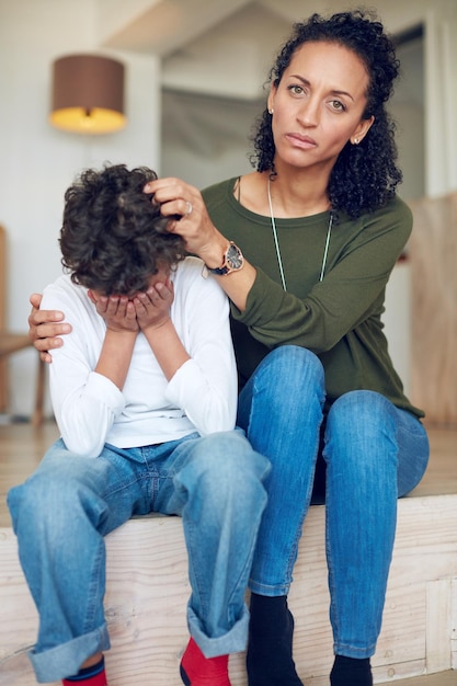 Ive been trying so hard to cheer him up Portrait of a mother comforting her little son at home